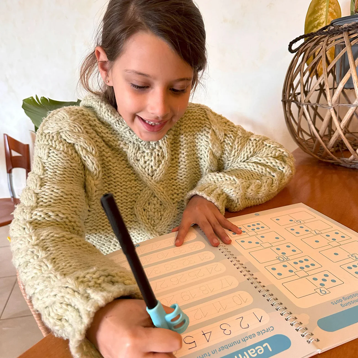 Child enjoying handwriting practice without stress